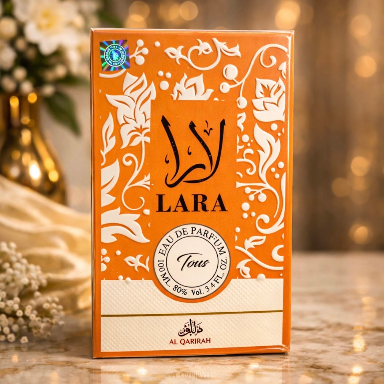 Lara perfume box with floral design on a blurred background