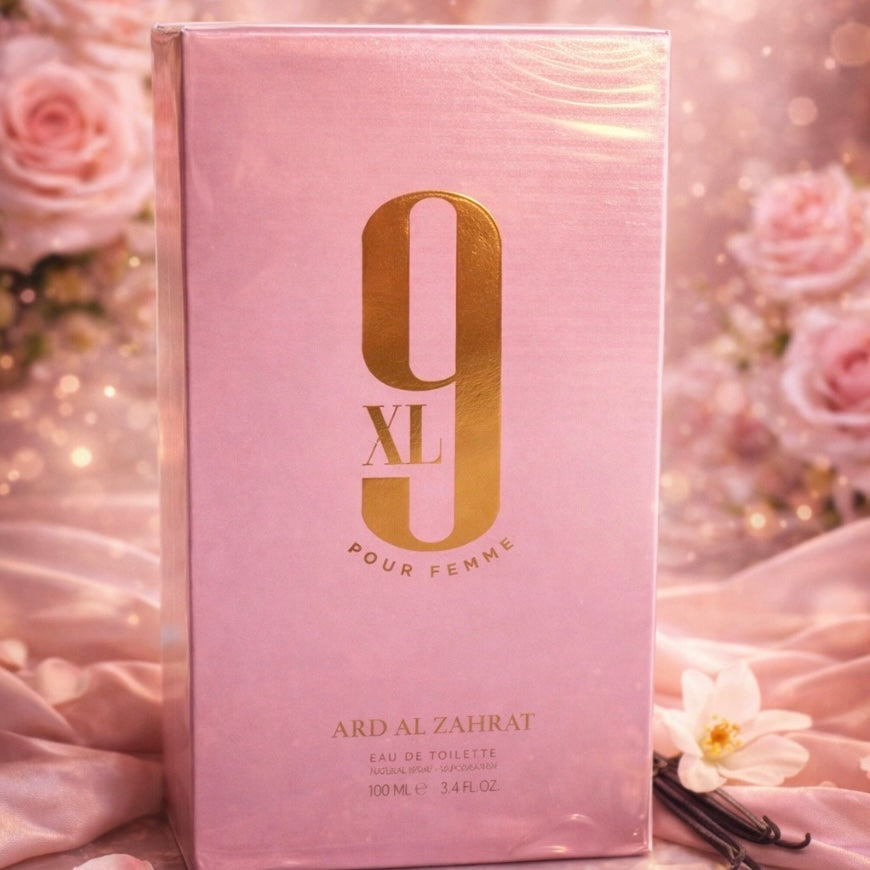 Pink and gold perfume box with floral background