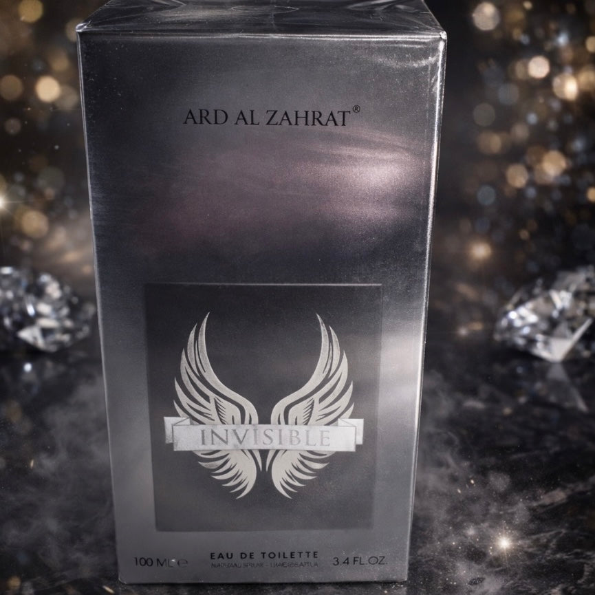 Ard Al Zahrat Invisible perfume box on a reflective surface with blurred lights in the background
