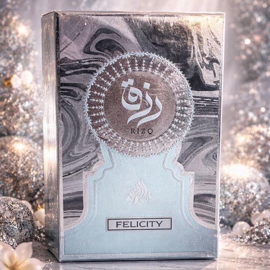 Product packaging with 'RIZQ' branding and 'Felicity' text on a decorative background