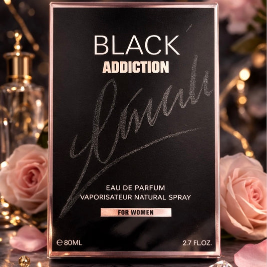 Black Addiction perfume packaging with roses in the background