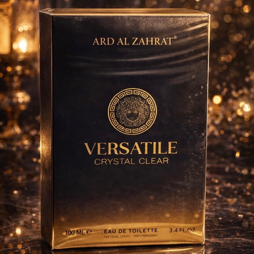 Ard Al Zahrat Versatile Crystal Clear eau de toilette packaging on a glittery background