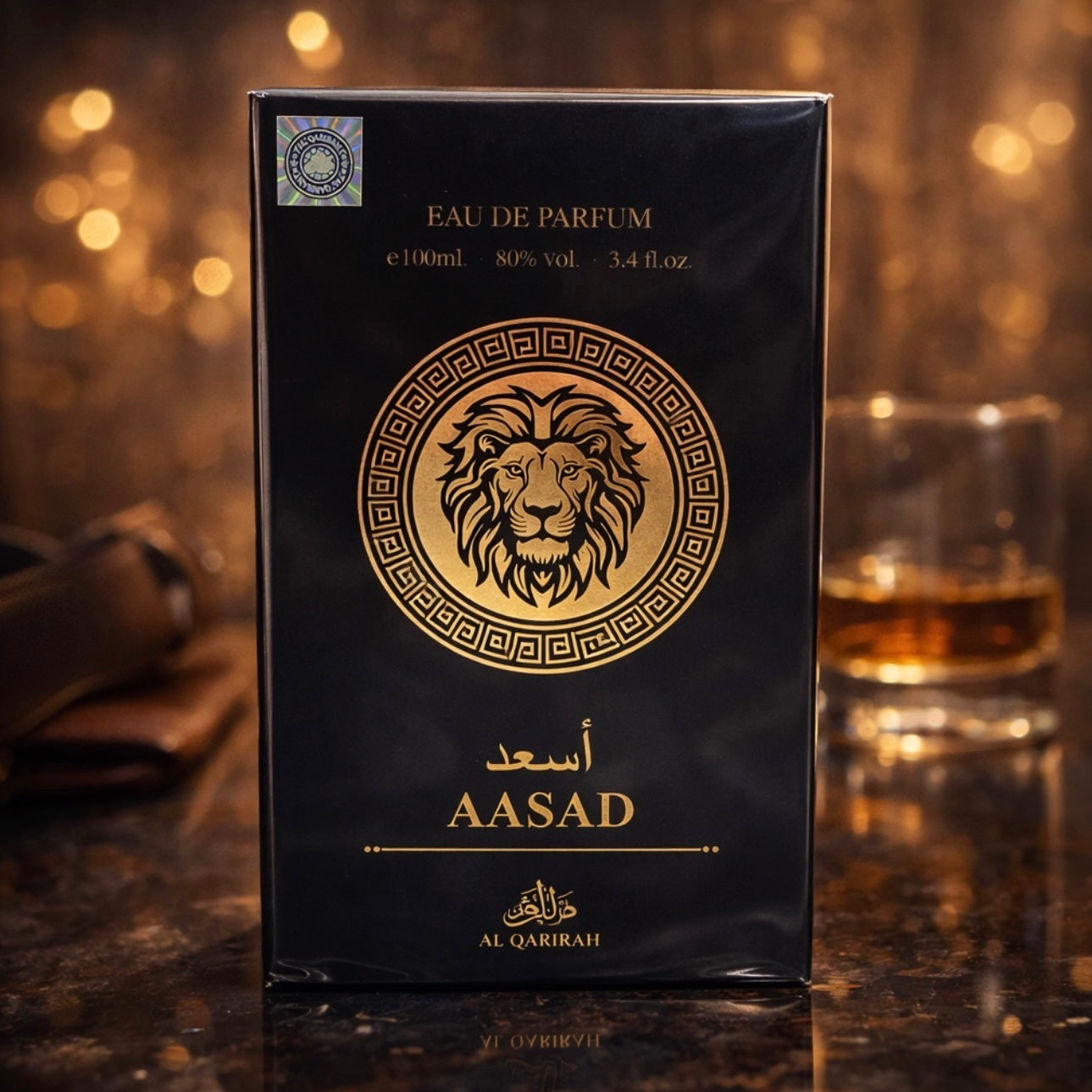 Eau de Parfum packaging with a lion emblem and 'AASAD' branding on a dark background.