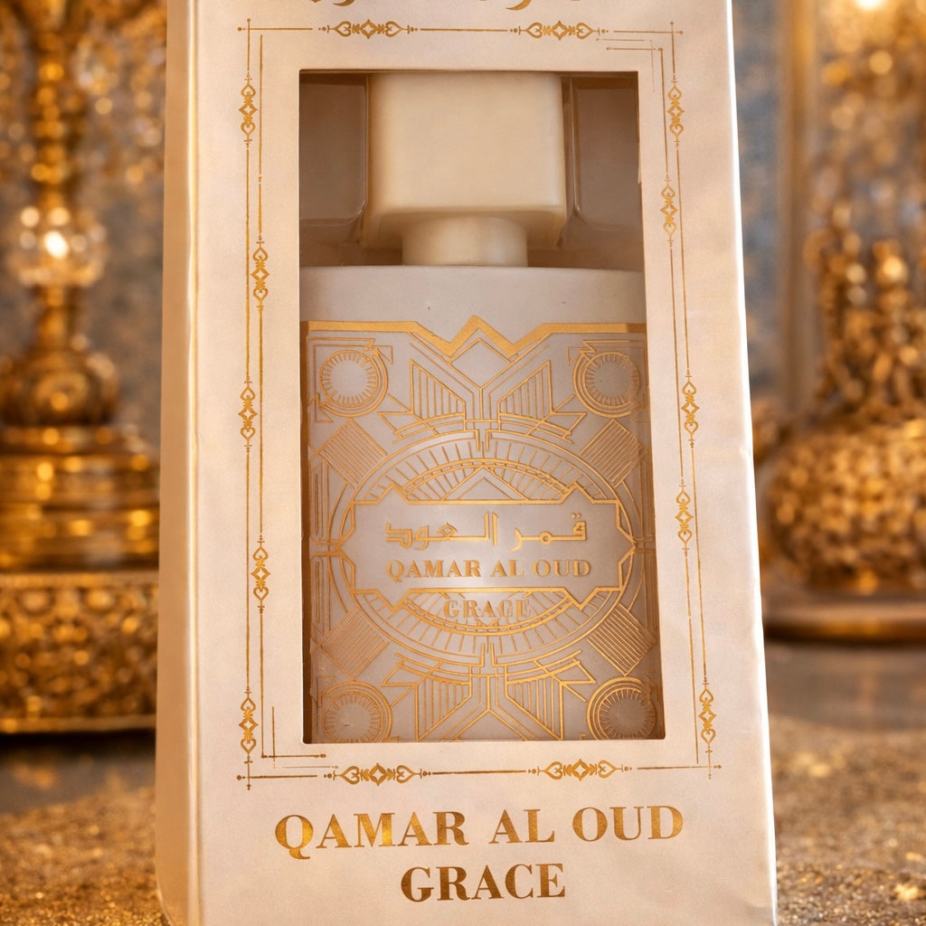 Qamar Al Oud Grace perfume bottle in decorative packaging with gold accents.