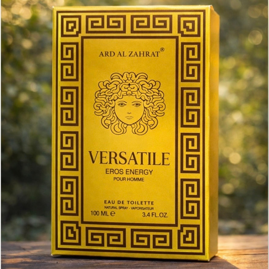 Versatile Eros Energy pour homme perfume box with decorative design on a blurred natural background